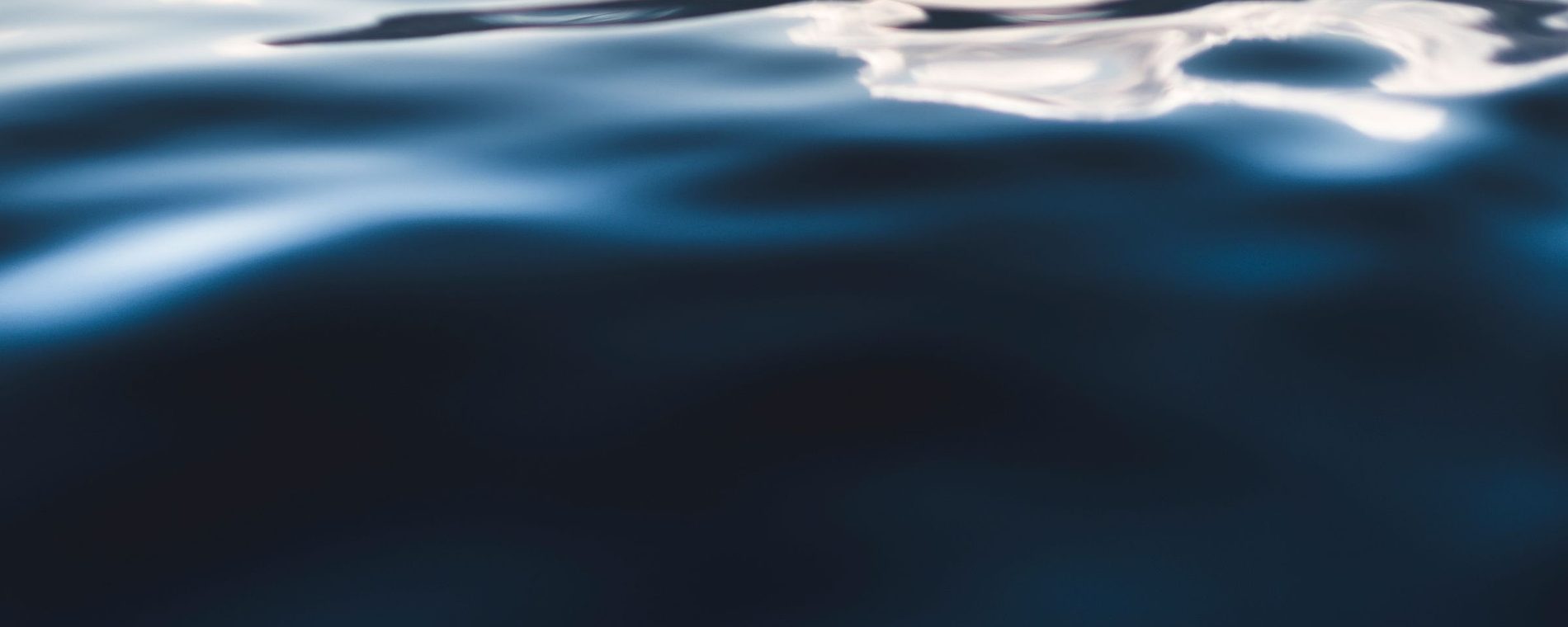 Soft light reflecting off a calm water surface